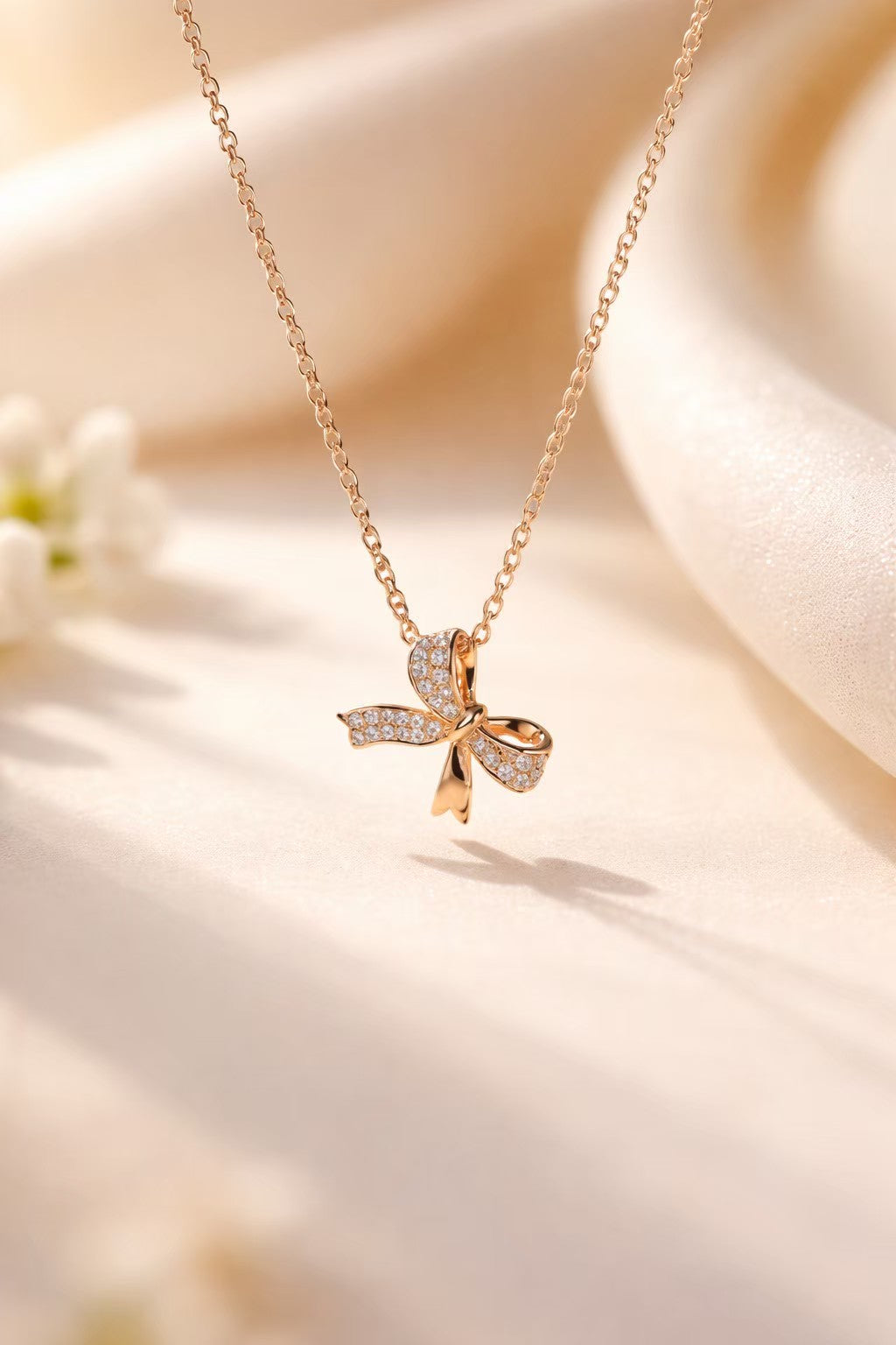 Sparkling Rose Gold Ribbon Bow Necklace